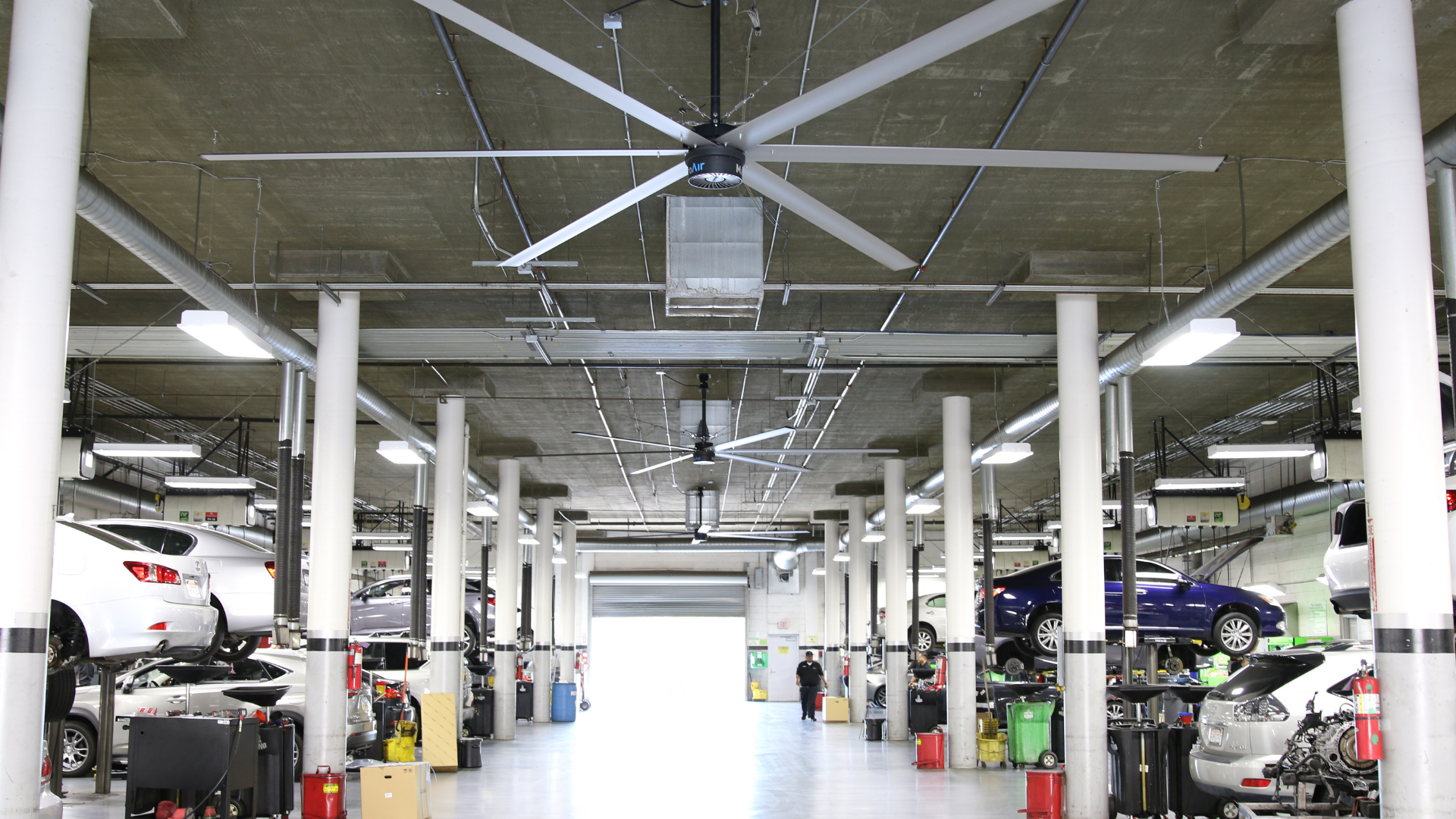 Industrial fans in auto shop bays